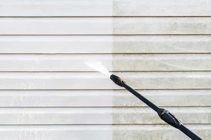 Residential exterior power washing in Apopka, FL: Before and after transformation.